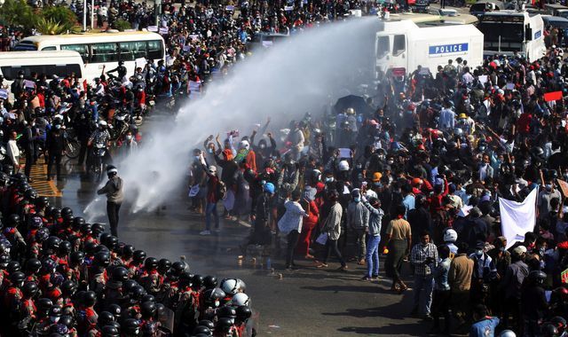 Myanmar coup Police use water cannon