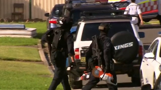Siege underway with armed man barricaded