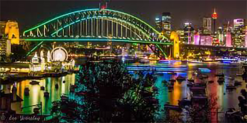 Sydney Harbour lit up blue by rare