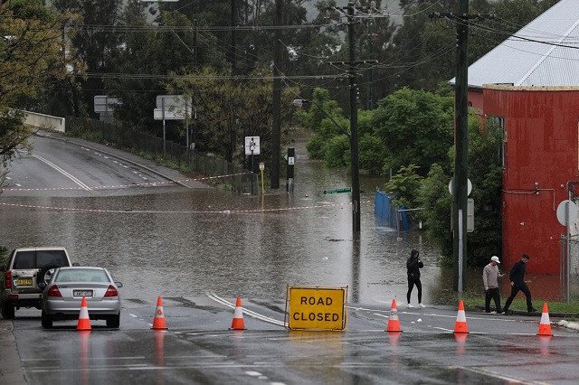 Parts of Sydney told to evacuate as heavy